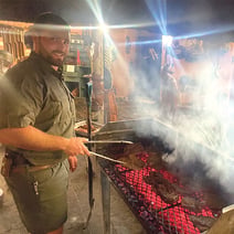man grilling