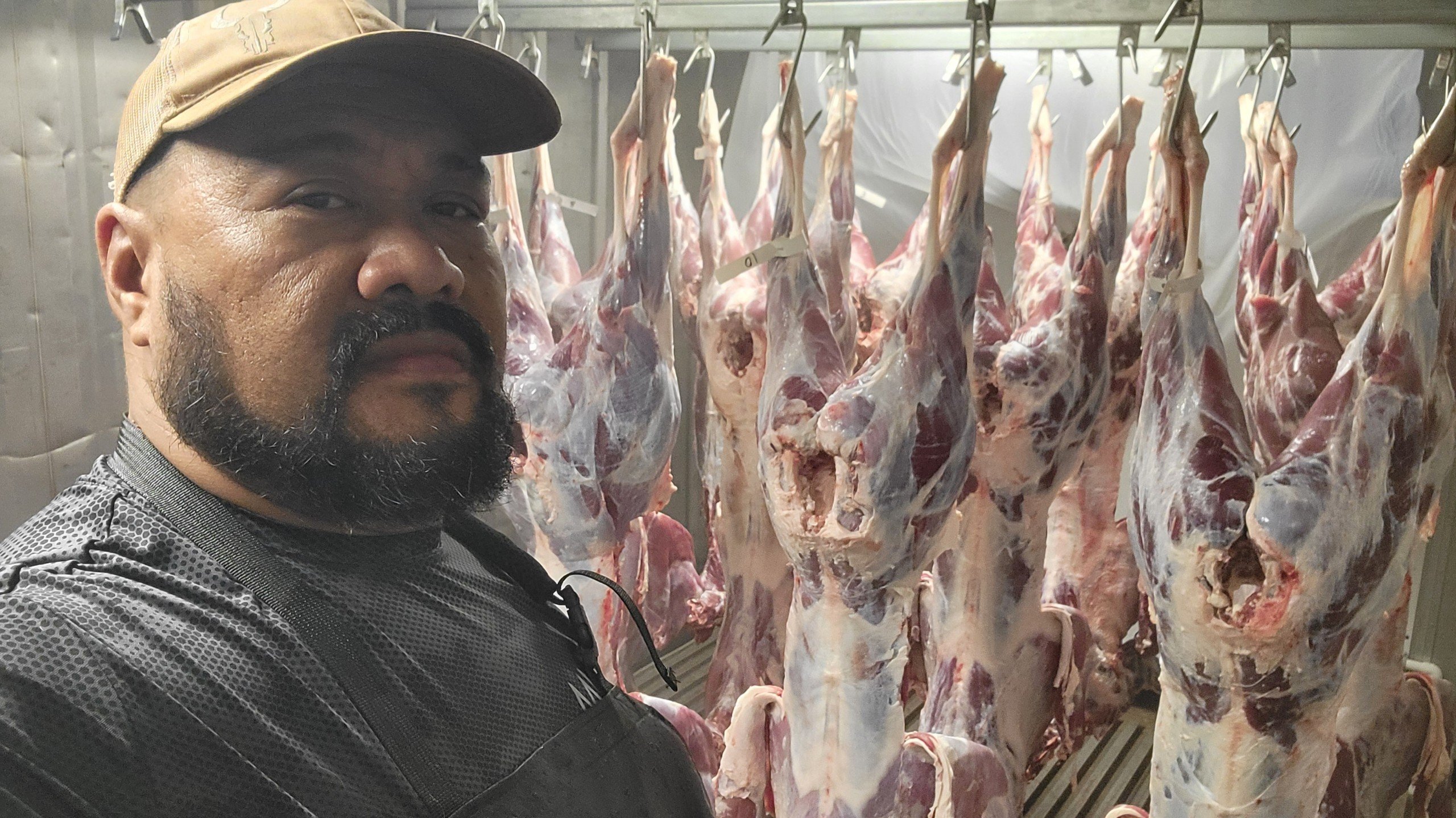 man in meat freezer