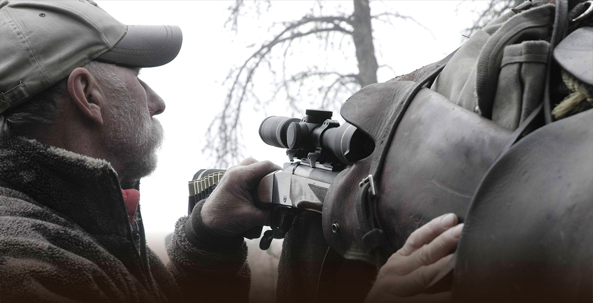 man with rifle