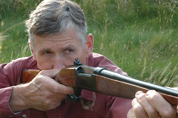 man with old rifle