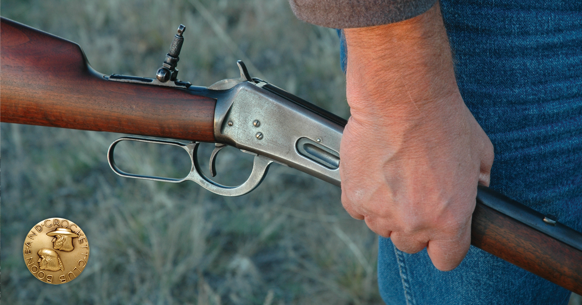 man holding rifle
