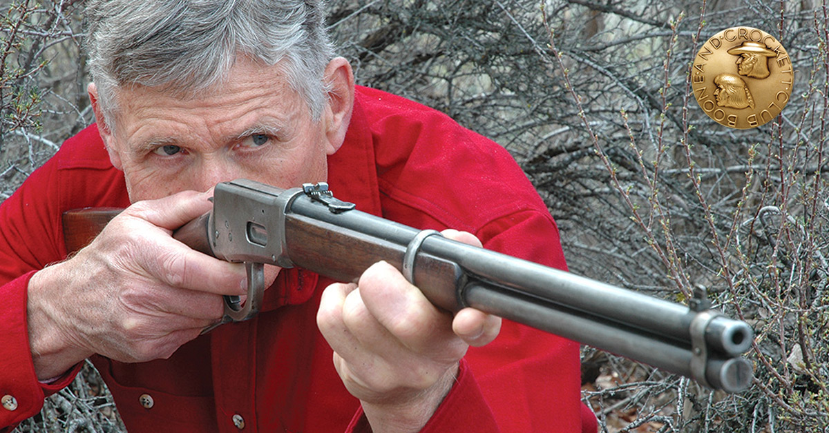 man holding rifle